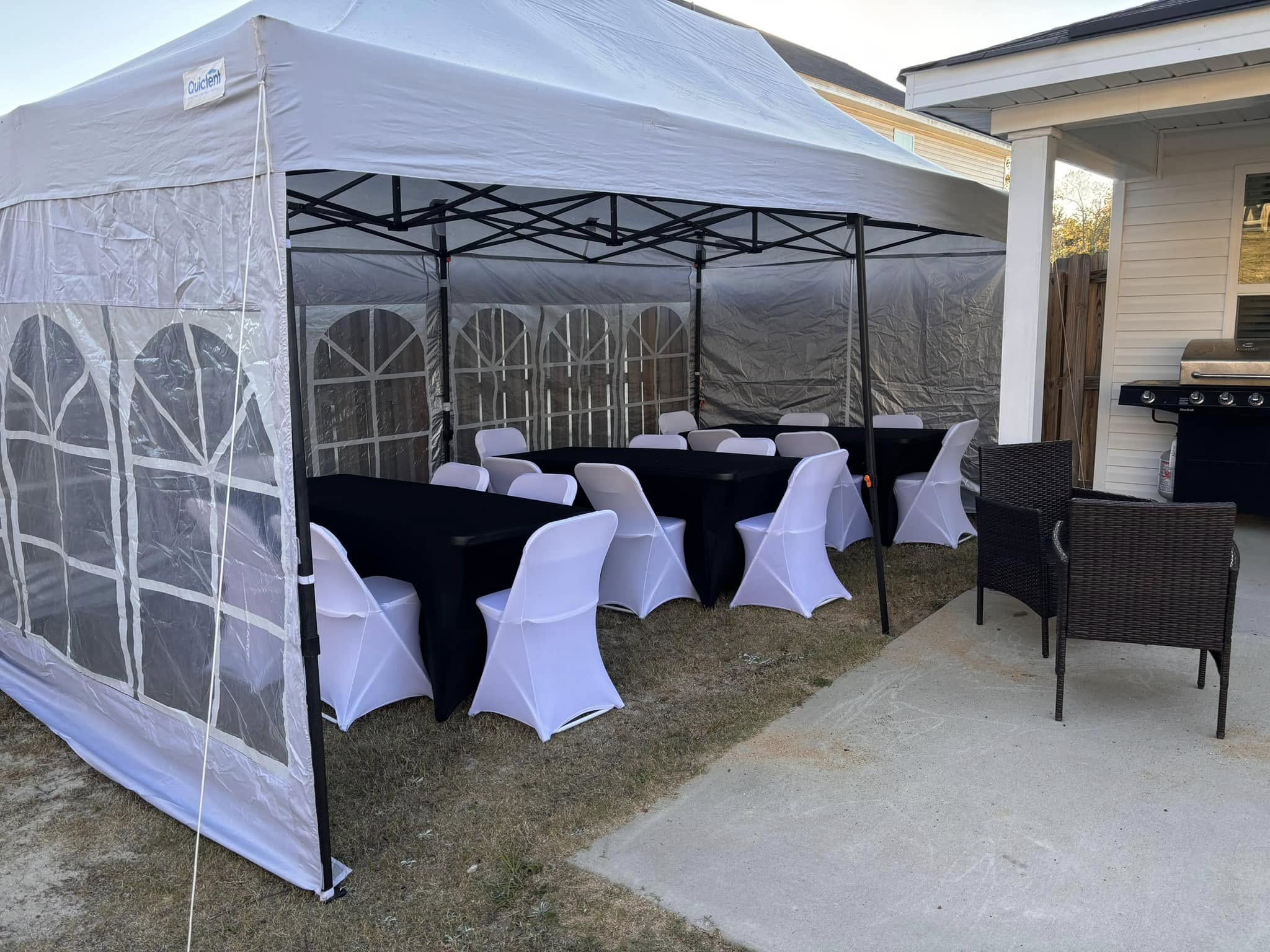 10x20 tent with linens prepared for a styled reception area